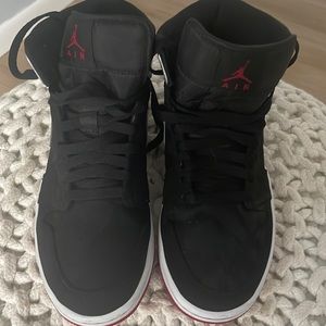 Air Jordan mid 1. Ted, black & white. Athletic shoe. Men size 8. Gently worn.